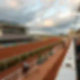 A panoramic view of a historic horse race track showcasing its grandstands and racetrack.